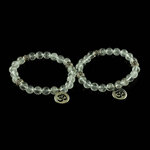 Bergkristal armband met ohm - Just Flow - webwinkel met violet glas, edelsteenremedies, edelstenen, sieraden, pendels, orakelka