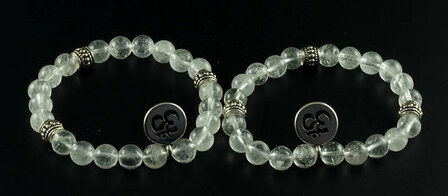 Bergkristal armband met ohm - Just Flow - webwinkel met violet glas, edelsteenremedies, edelstenen, sieraden, pendels, orakelka