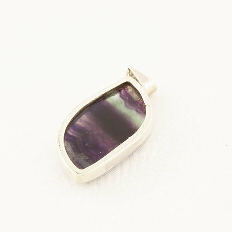 Fluoriet in zilver - Just Flow - webwinkel met violet glas, edelsteenremedies, edelstenen, sieraden, pendels, orakelkaarten, wierook, smudgekruiden en spirituele artikelen in Vlissingen (Zeeland)